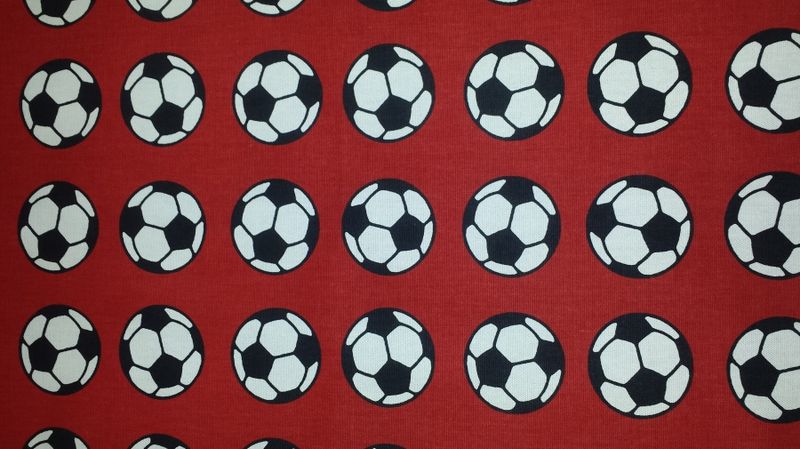 Metervare m/fotballmønster, rød bunn